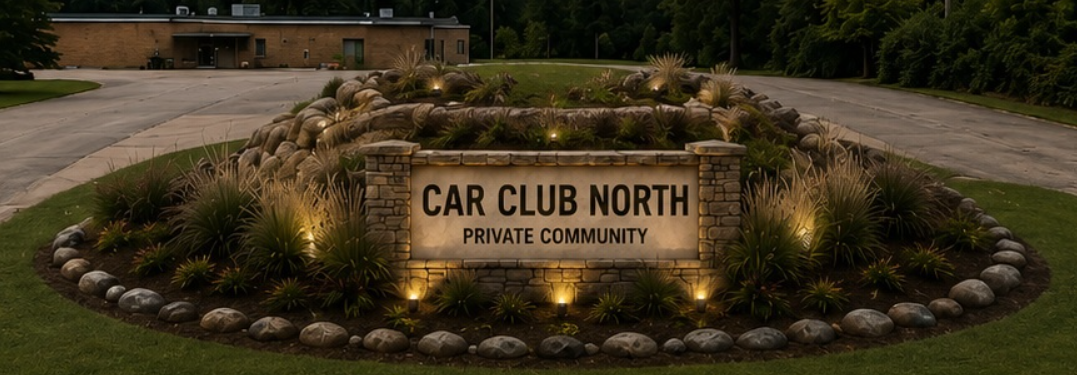 Car Club North — lit entrance sign reading Car Club North, Private Community, at the property in Ortonville, Michigan